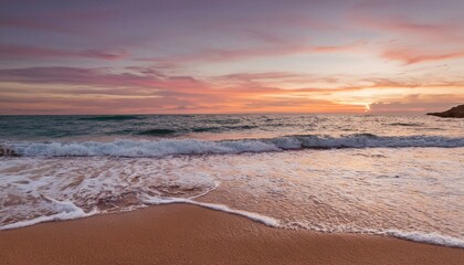 Obraz premium Waves on the beach at red sunset