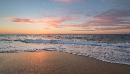 Waves on the beach at red sunset