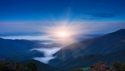 Waves of light in the mountain valley stretch into the sky