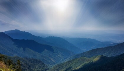 Obraz premium Waves of light in the mountain valley stretch into the sky