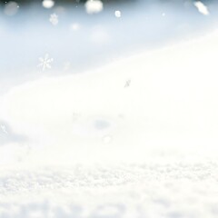 Falling snowflakes on a snowy ground; serene, wintery atmosphere. Background is unclear.