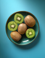 Kiwi, isolated on a pastel blue