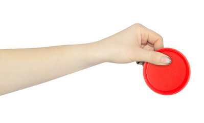 wide cap from a plastic bottle in hand, outstretched hand with cap from a plastic bottle isolated from background	