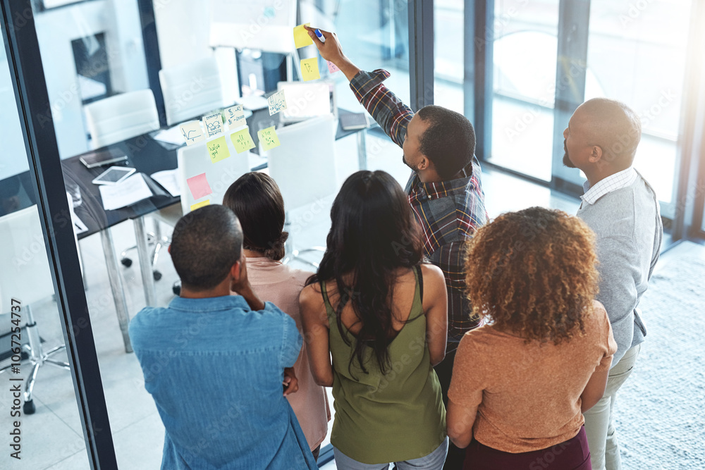 Poster glass, planning and pointing with business people in office for coaching or meeting from above. semi
