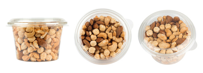 set of various nuts in a plastic container. Cashew, migdal and hazelnut. Isolated from background