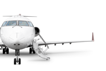 Front view of the business jet with an opened gangway isolated