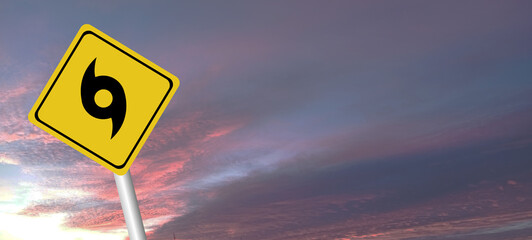 danger,caution,Hurricane Idalia warning sign against a powerful stormy background with copy space. Dirty and angled sign with cyclonic winds add to the drama.hurricane season sign on cloudy background
