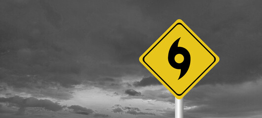 danger,caution,Hurricane Idalia warning sign against a powerful stormy background with copy space. Dirty and angled sign with cyclonic winds add to the drama.hurricane season sign on cloudy background
