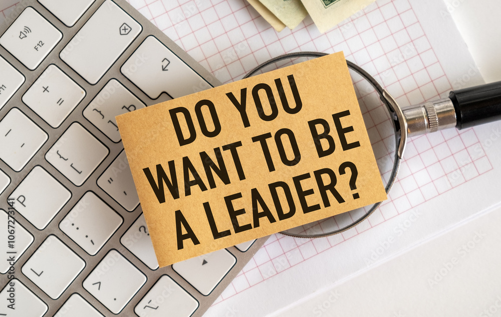 Fototapete do you want to be a leader text inscription on a card lying on a magnifying glass with a keyboard an