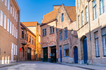 Medieval architecture and cozy narrow street of Bruges town, Belgium