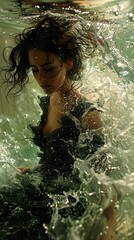 Underwater Portrait of a Woman in a Black Dress