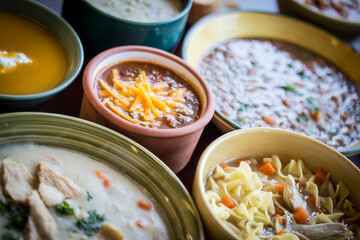 Soup varieties on table