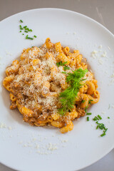 Cavatappi bolognese in bowl