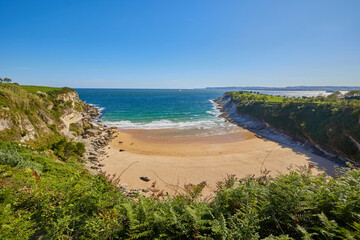 Sunny day on a Matalenas Beach in Santader, Spain