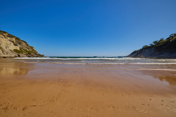 Sunny day on a Matalenas Beach in Santader, Spain