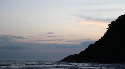 sunset over the sea at Barra do Una