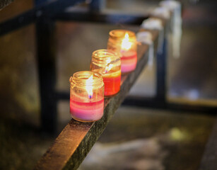 Burning candles inside the church in Liliw Laguna.