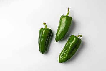 Fresh green bell pepper. Paprika. Close-up of fresh green bell pepper isolated on white background