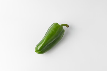 Paprika. Close-up of fresh green bell pepper isolated on white background
