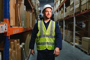 Shipment manager verifying all merchandise pallets in depot, providing merchandise distribution for...
