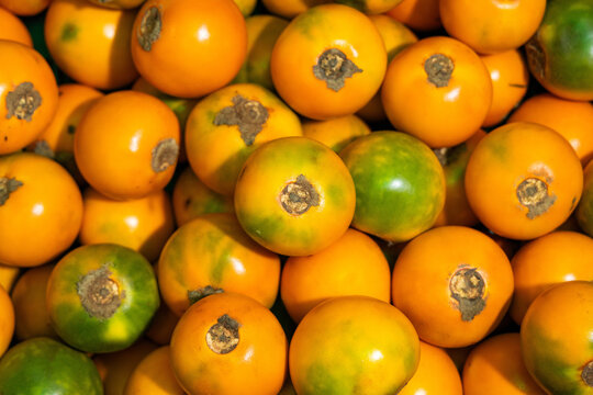 Lulo tropical fruit in Colombian market square - Solanum quitoense