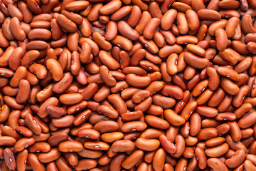 Raw dried beans in foreground - Phaseolus vulgaris.