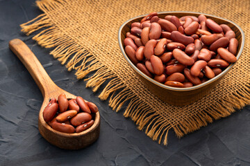 Nutritious dried beans - Organic beans in bowl and spoon.