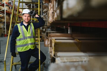 Shipment manager verifying all merchandise pallets in depot, providing merchandise distribution for...