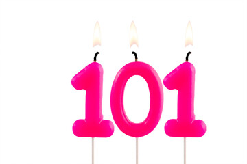 Pink number 101 birthday candle lit on white background