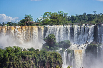 Fototapeta premium Panoramic view of Iguazu Falls on a sunny day, Misiones, Argentina