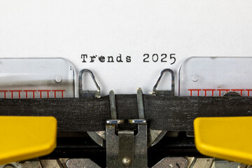 Trends 2025 written on an old typewriter	