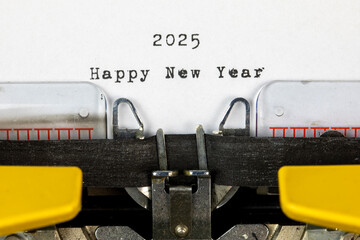 Happy New Year 2025 written on an old typewriter	