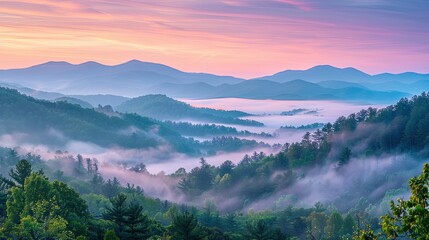 Sunrise illuminating foggy mountains in north carolina blue ridge parkway