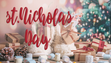 St. Nicholas Day.Boots with sweets and gifts on the floor in the room, St. Nicholas Day greeting card,Christmas Eve,sinterklaas