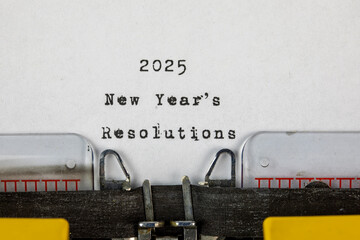 2025 New Years Resolutions written on an old typewriter	