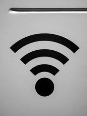 Black Wi-Fi symbol on light gray background.