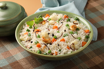 Indian veg biryani, veg pulav, Indian vegetable pulav, Biriyani, vegetable Biriyani served in a ceramic bowl