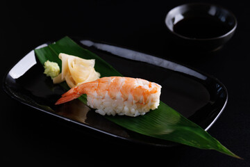 shrimp sushi isolated in black background