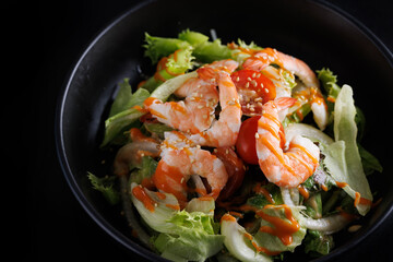 Japanese salad isolated in black background