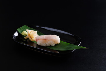 Sea bream sushi Japanese food Japanese Seafood isolated in black background