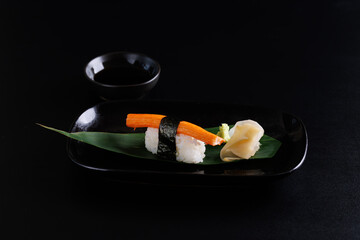 crab stick sushi Japanese food Japanese seafood isolated in black background
