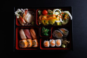 bento sushi set japanese food isolate in black background isolate in black background