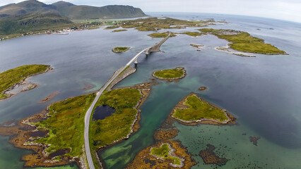 Wide angle, aerial shot  of the  scenic  cantilever bridges connecting the fishing village of Fredvang on the island of Moskenesøya  in Lofoten.   © TOMASZ