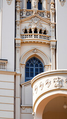 Obraz premium detailed facade a building with ornate archway balcony