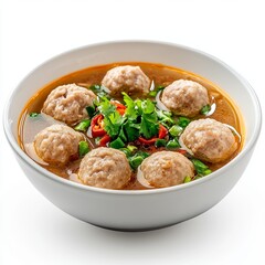 Popular Savory Indonesian Meatball Soup (Bakso) in a Classic White Bowl, Isolated on White