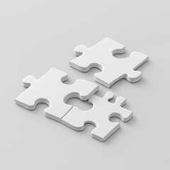 Blank white puzzle pieces scattered on table