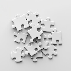 Obraz premium Blank white puzzle pieces scattered on table