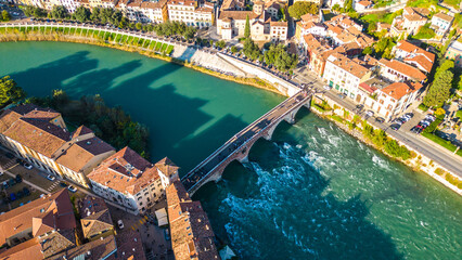 Verona, a beautiful and historic city in northern Italy, shines under sunny skies. Known as the city of Romeo and Juliet, Verona attracts tourists with its rich cultural heritage, charming streets