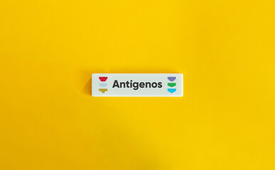 Antigens Concept Image. Icon and Text on Block Letter Tile on Yellow Background.