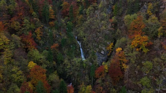A soteska Pekel waterfall in the autumn, Slovenia, drone video, aerial footage